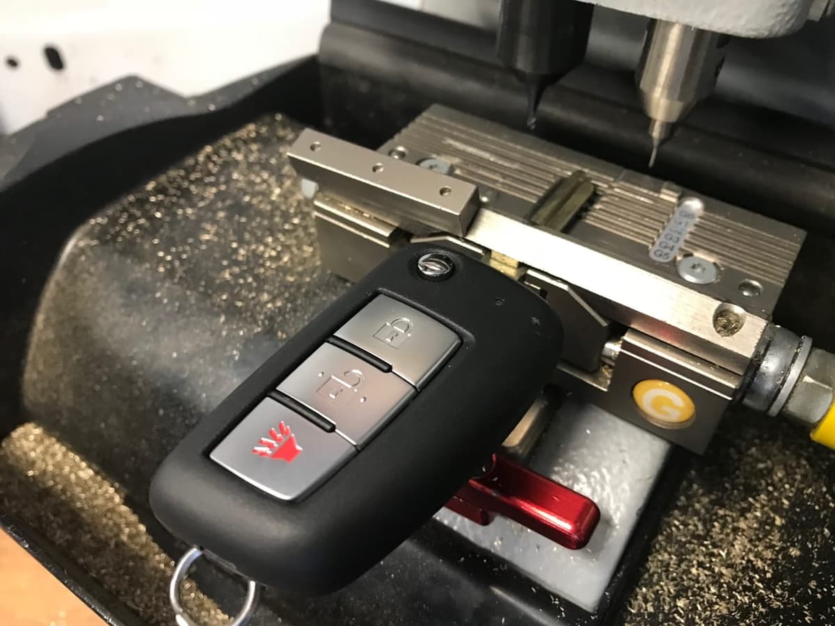 Transponder key being cut on professional key cutting machine
